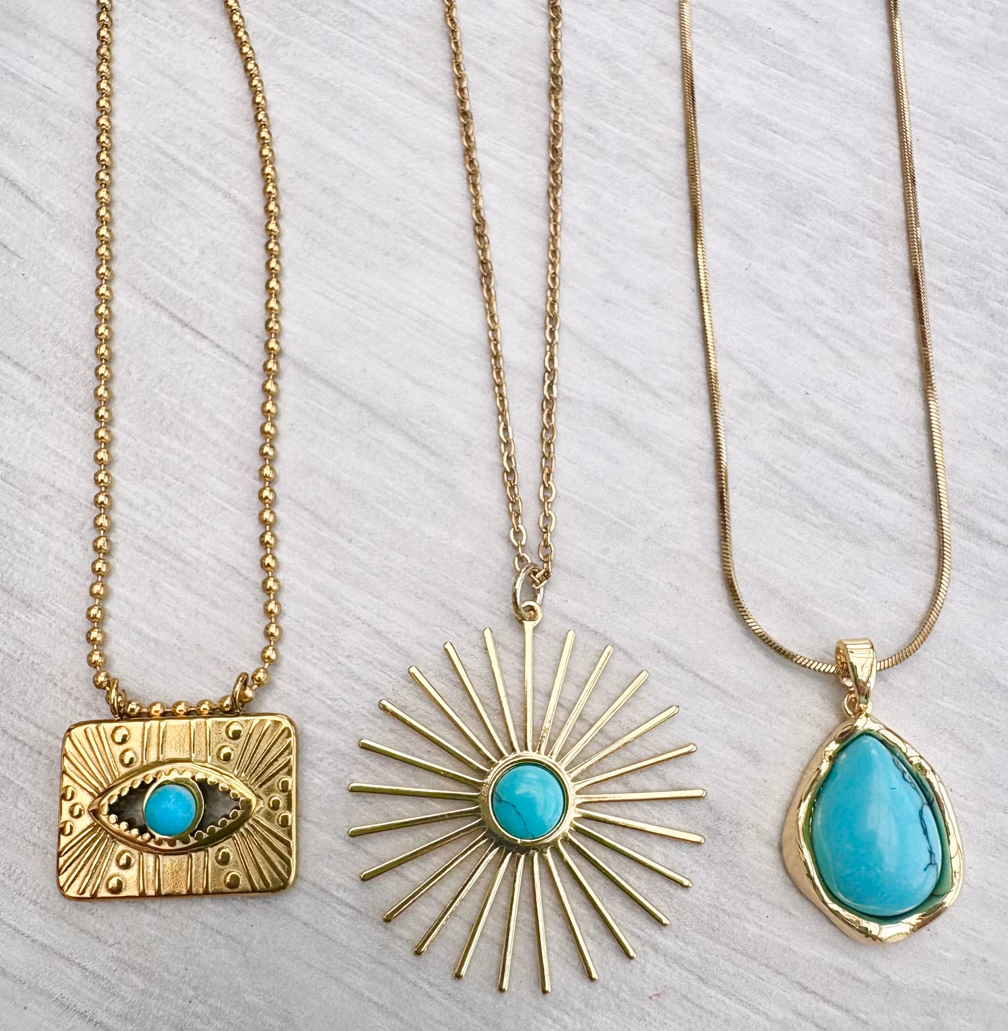 Guldfärgat rostfritt stål hänge turkos med öga och  PVD plätering, 1 st