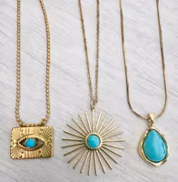 Guldfärgat rostfritt stål hänge turkos med öga och  PVD plätering, 1 st