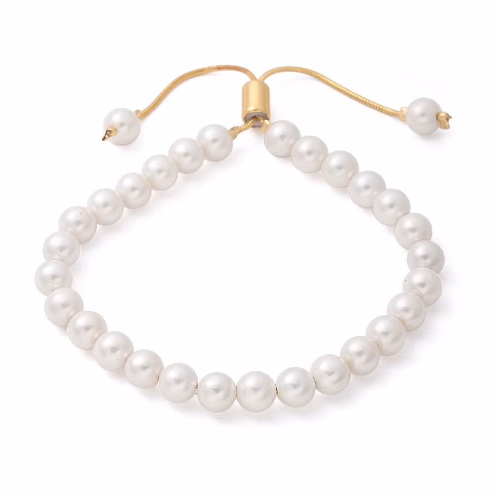 REA: Guldfärgat armband med vita pärlor, 1 st