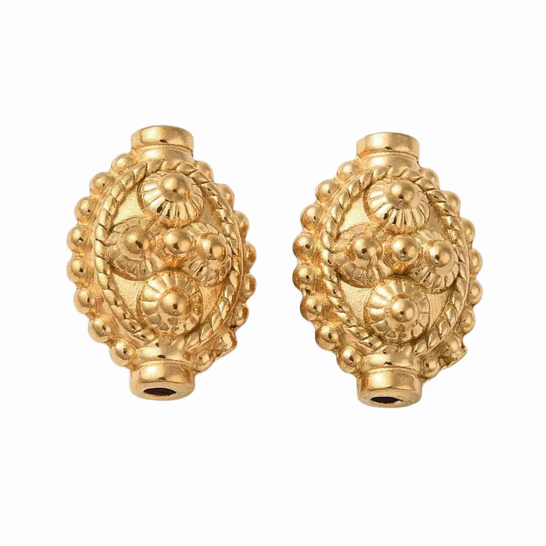 Kirurgiskt guldfärgat stål avlång mönstrad pärla med PVD plätering, 1 st