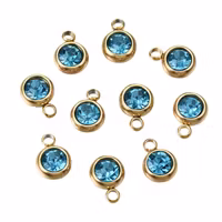 Guldfärgat rostfritt stål berlock liten turkos med PVD plätering, 1 st