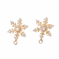 Guldfärgade stiftörhängen snöflinga och cubic zirconia, 1 par