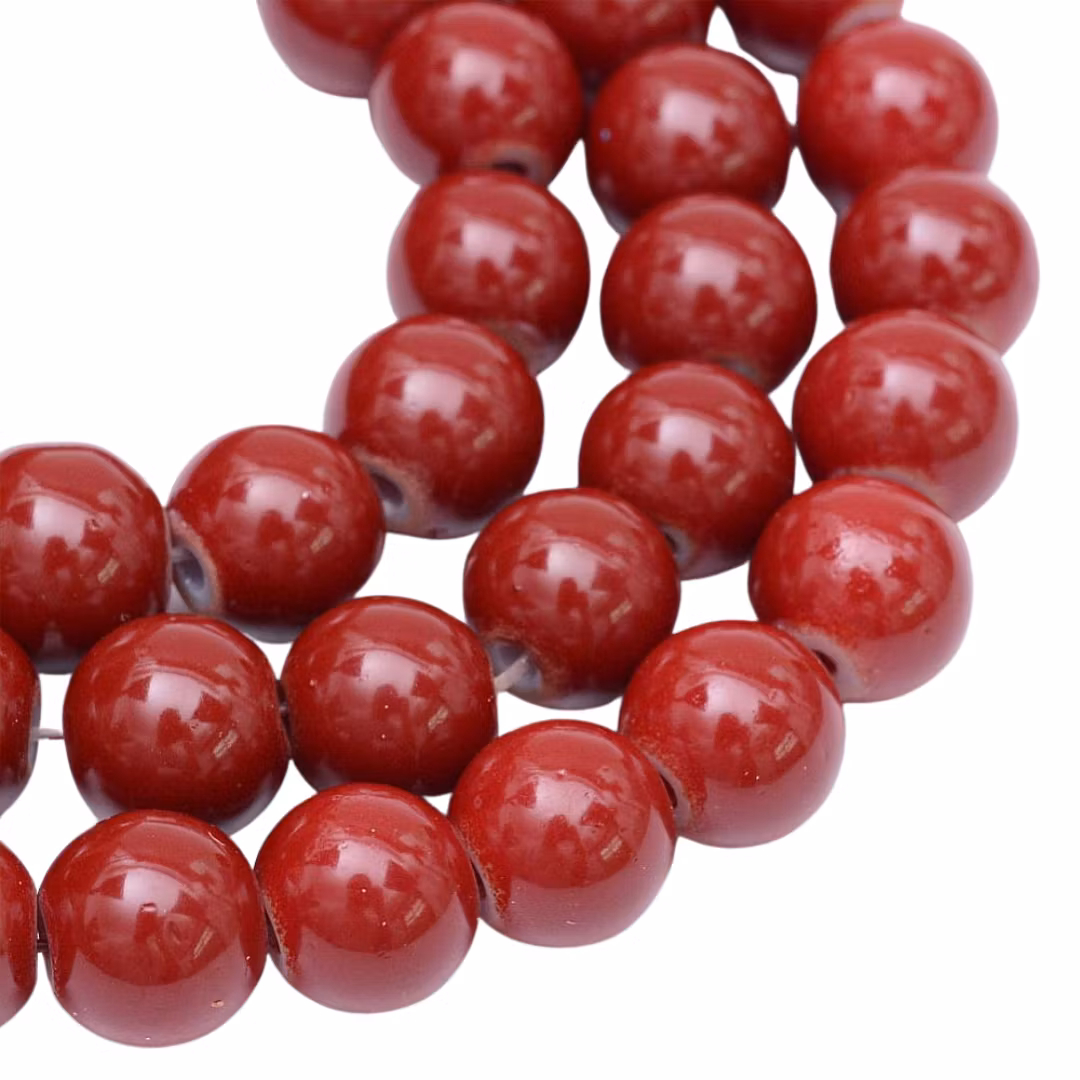 REA: Glaspärlor 4 mm brun/röda, 1 sträng