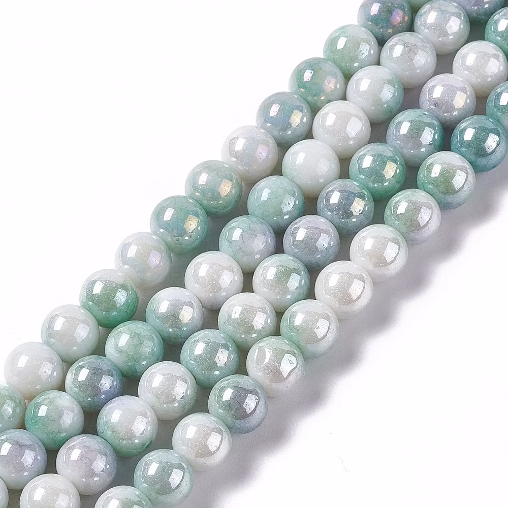 REA: Glaspärlor runda grön/lilamelerade, 1 sträng