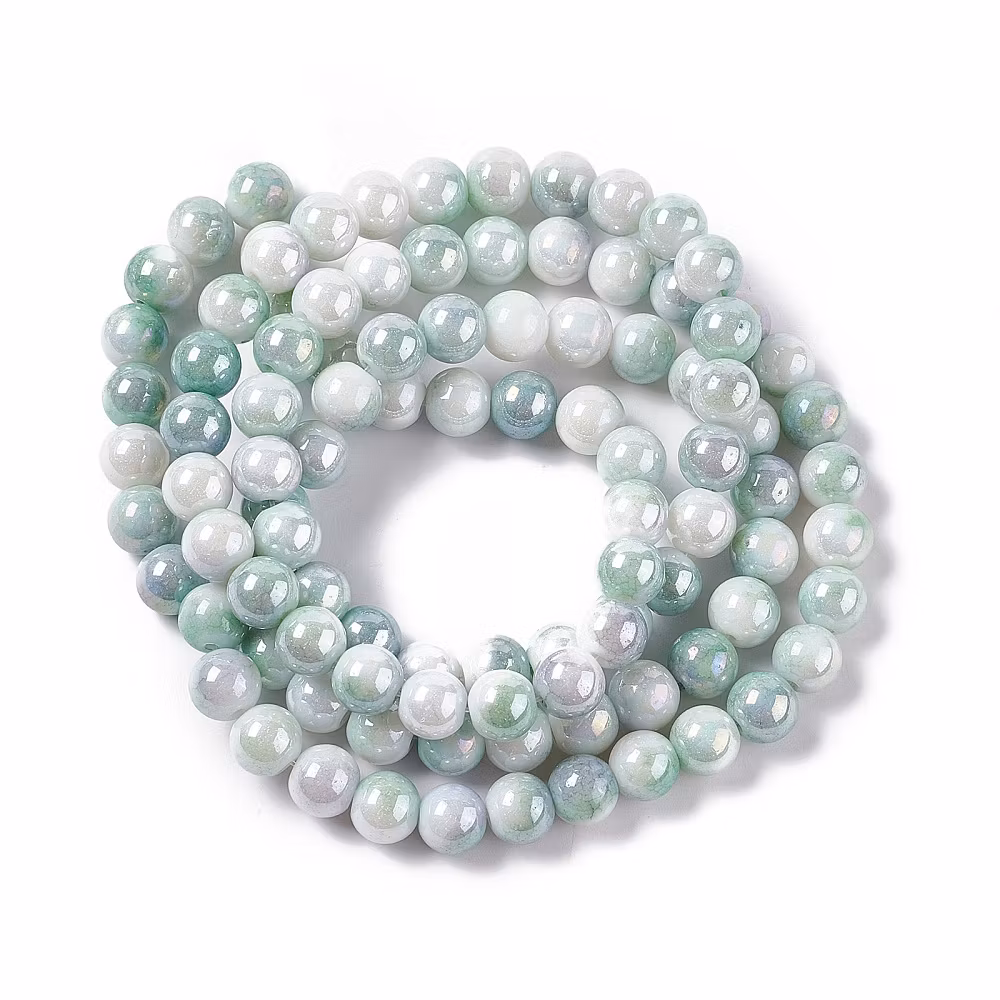 REA: Glaspärlor runda grön/lilamelerade, 1 sträng