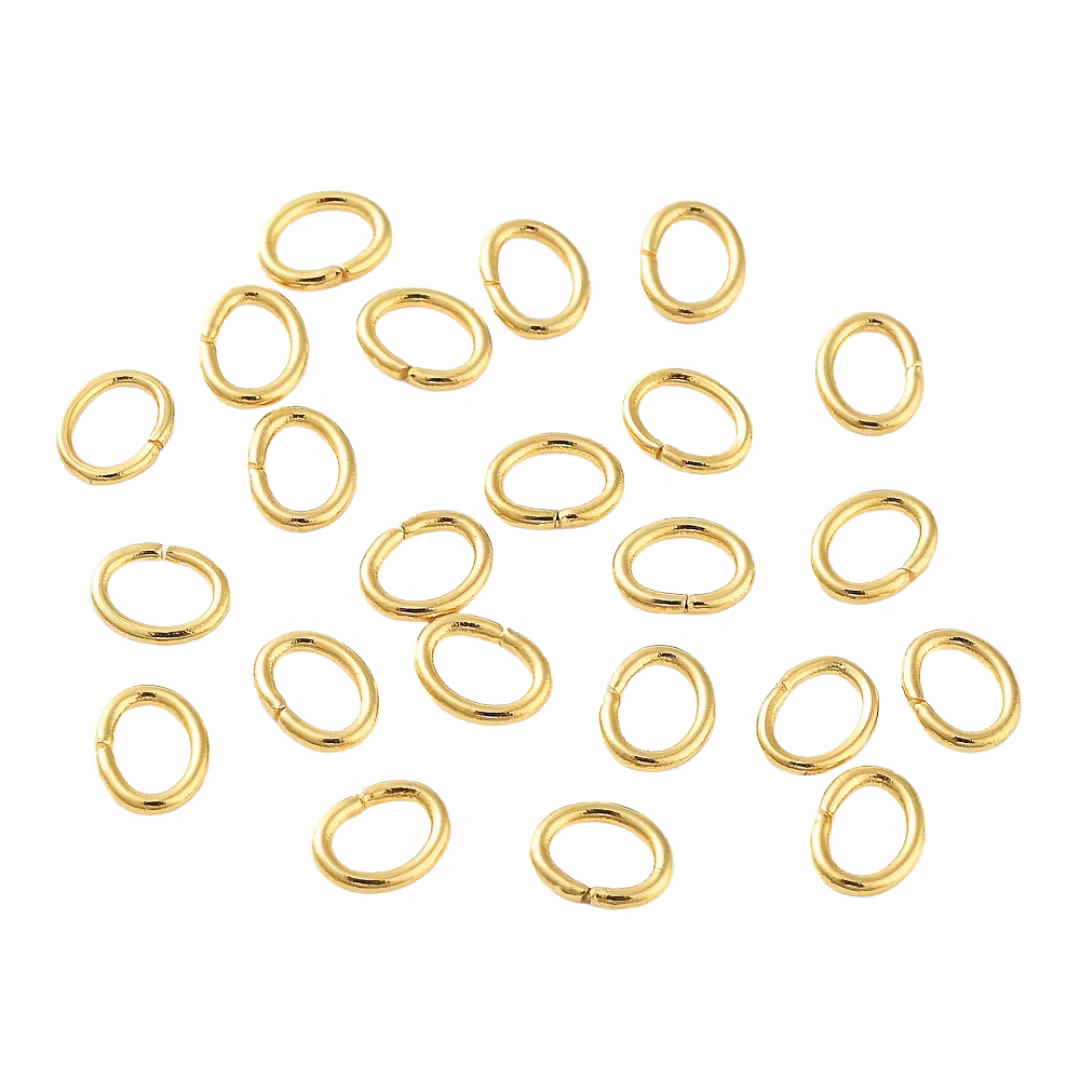 Guldfärgat rostfritt stål ovala bindringar 5x6 mm med 18k plätering, ca 20 st