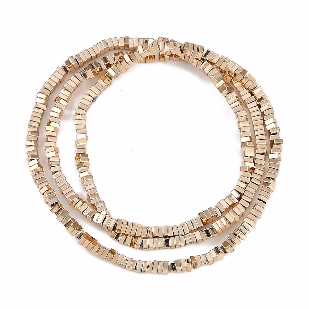 REA: Ljust guld/roséfärgad hematit fyrkanter 2 mm, 1 sträng