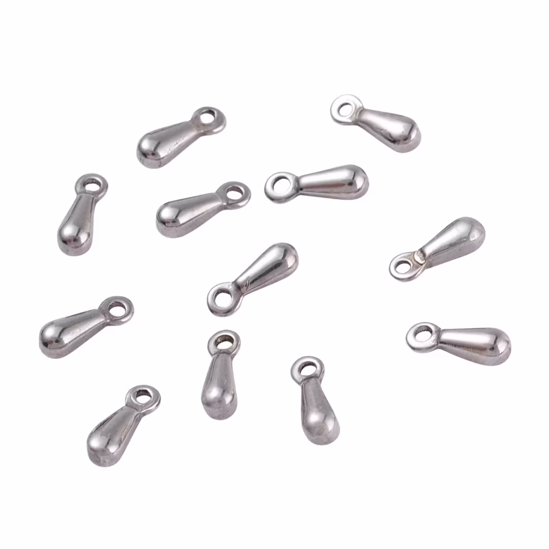 Guldfärgat kirurgiskt stål små droppar, 10 st