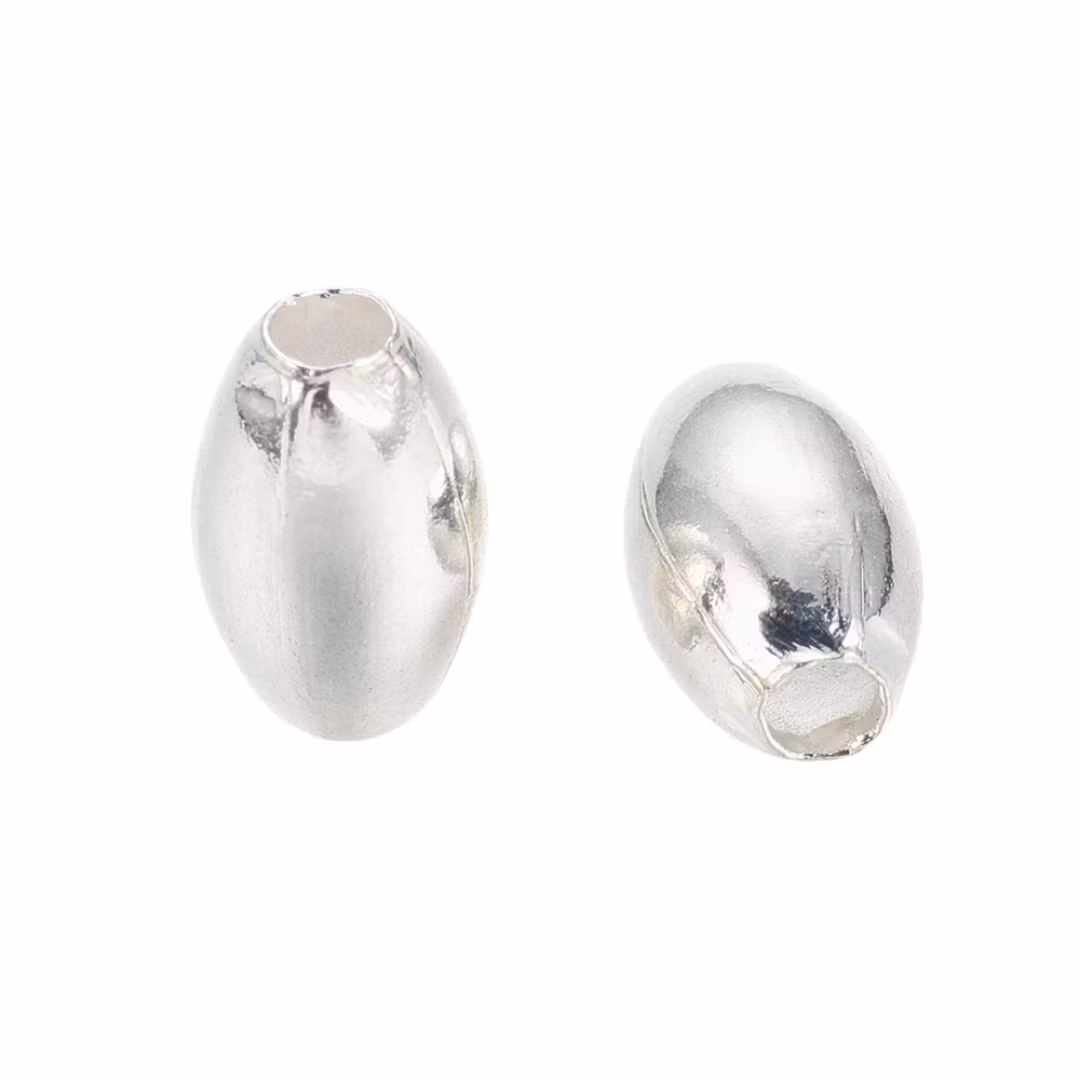Silverfärgat rostfritt stål ovala pärlor 7x4 mm, 10 st