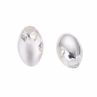 Silverfärgat rostfritt stål ovala pärlor 7x4 mm, 10 st