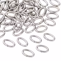 Storpack: Kirurgiskt stål ovala bindringar 8x5 mm, ca 100 st