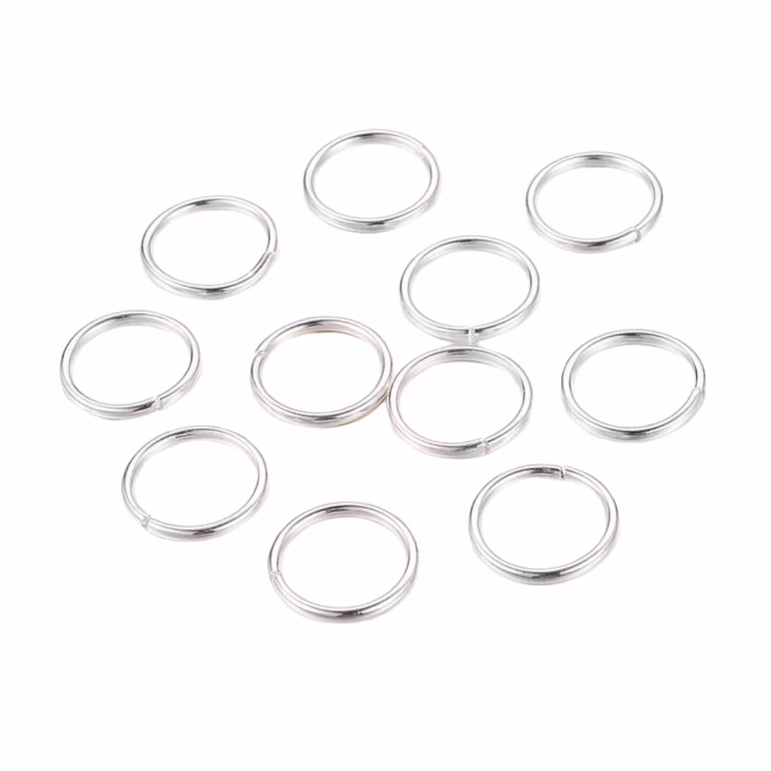 Silver-colored stainless steel binding rings 6 mm, approx. 100 pcs.