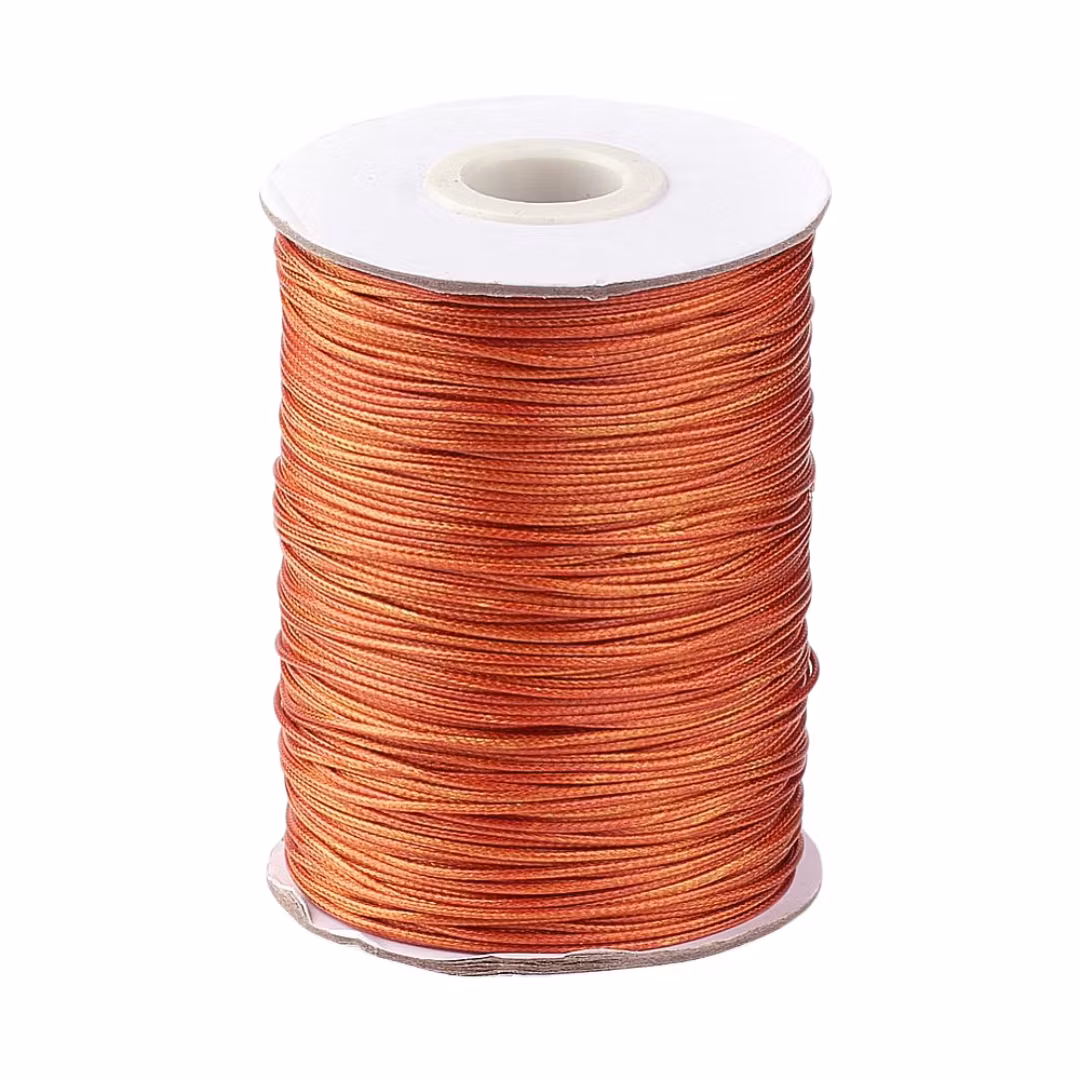 Vaxad bomullstråd 0.5 mm mörk orange, 5 m