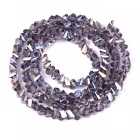 Triangelformade glaspärlor lila AB 3x4 mm, 1 sträng