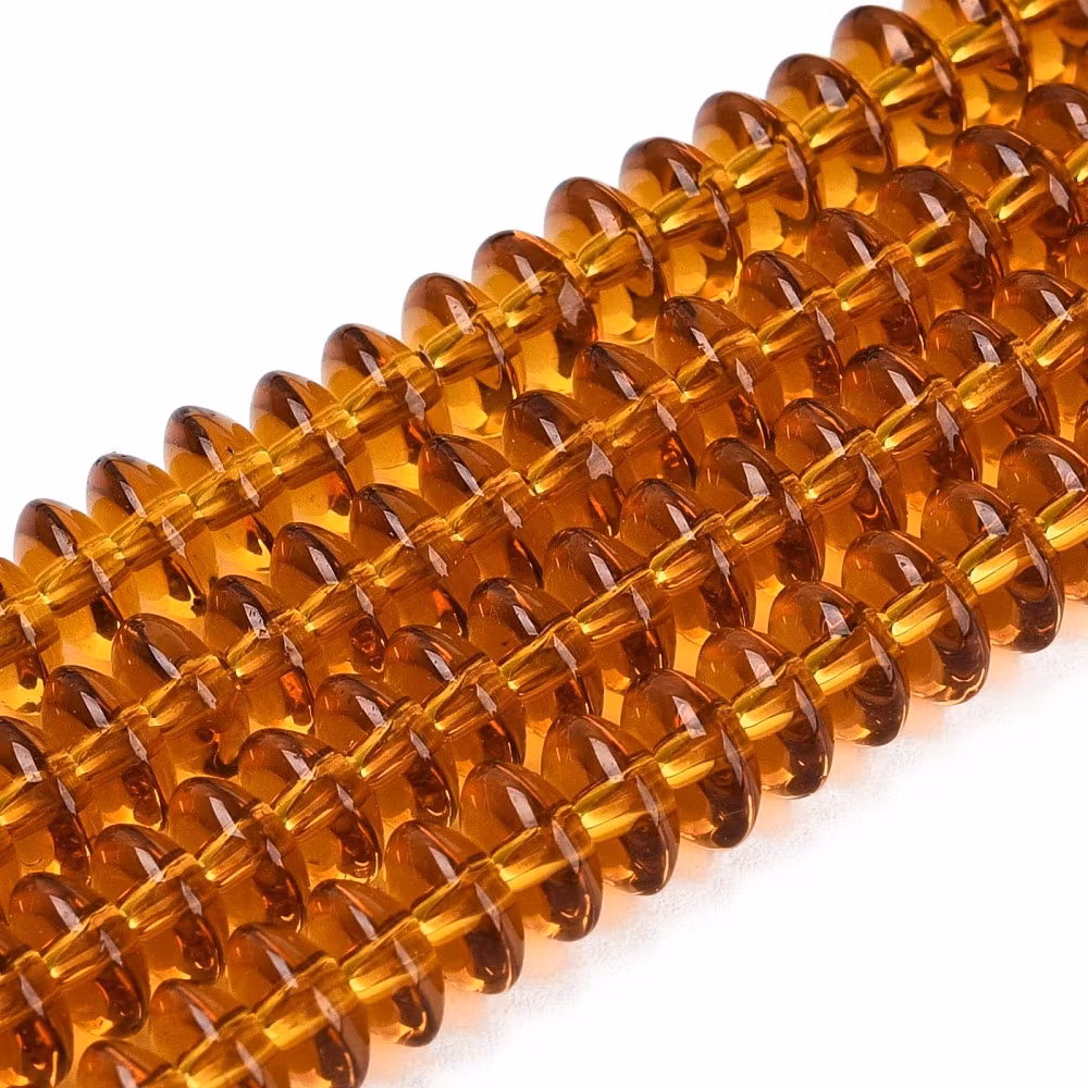 Glaspärlor rondeller guldbruna 6x3 mm, 1 sträng