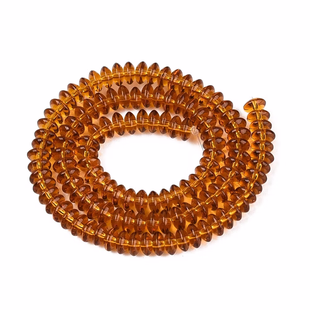 Glaspärlor rondeller guldbruna 6x3 mm, 1 sträng