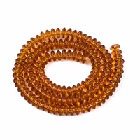 Glaspärlor rondeller guldbruna 6x3 mm, 1 sträng