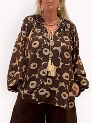 Nilla blommönstrad blus brun