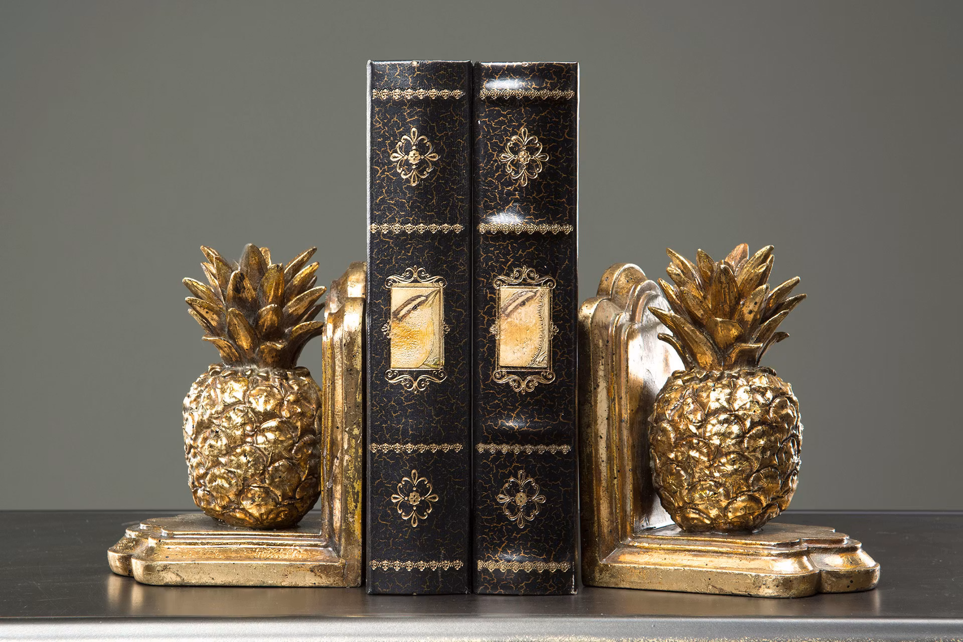 Bokstöd Ananas Guld