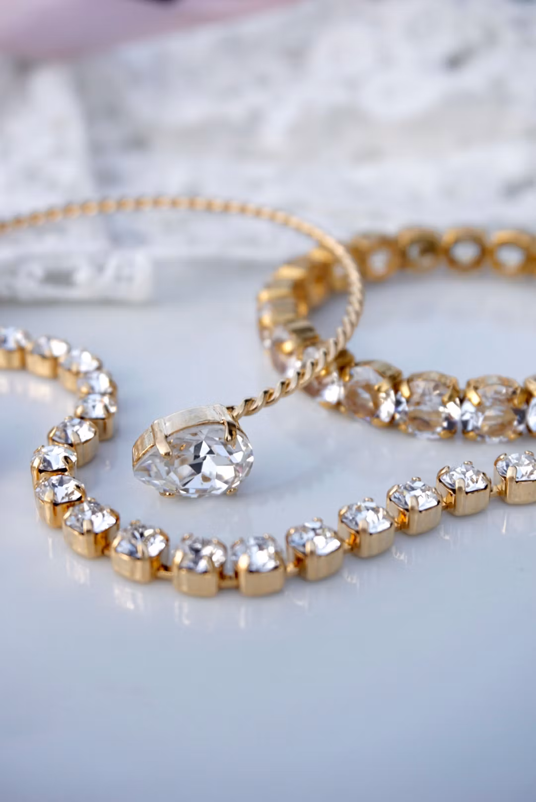 Zerlina armbånd i gull, rosegull eller rhodium