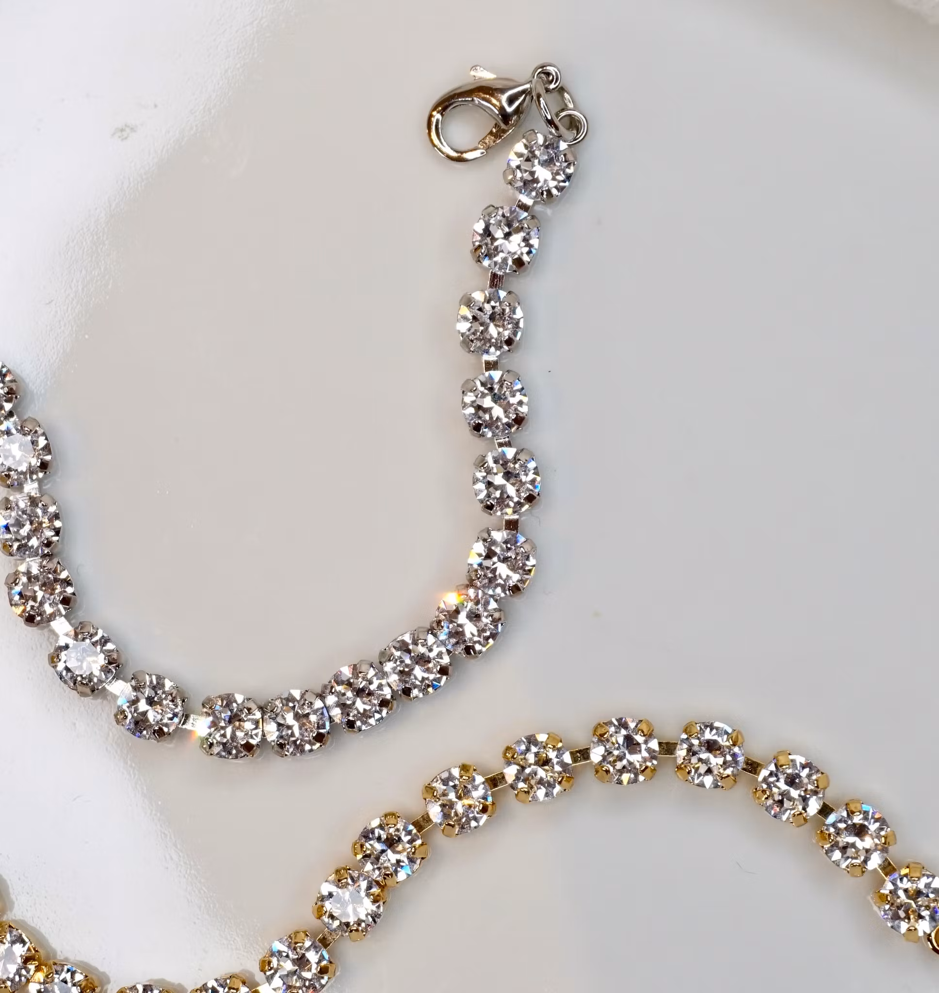Zerlina armbånd i gull, rosegull eller rhodium