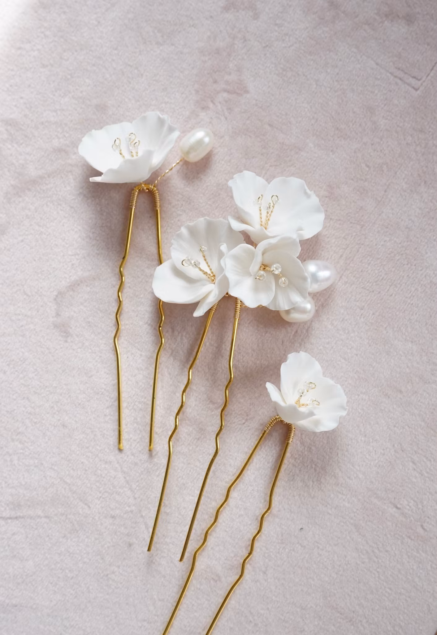 Trio hårpynt med støvbærere, gull eller sølv