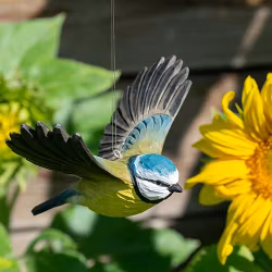 Handsnidad Flygande Blåmes i trä