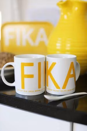 Bricka FIKA, gul (with English text)
