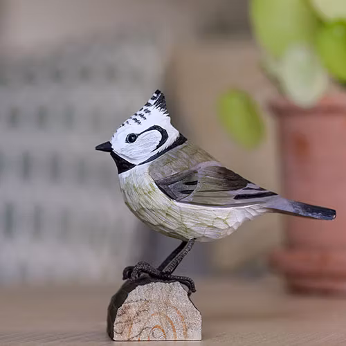 Handsnidad Tofsmes i trä