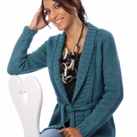 1252 Cardigan med sjalkrage och mönster på bakstycket.