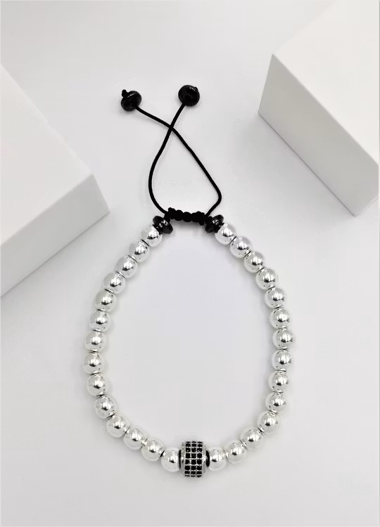 Wheal Charm Pearl Pärlarmband bild 2 är ett vacker och flexibel herr armband med ett vackert kombination.