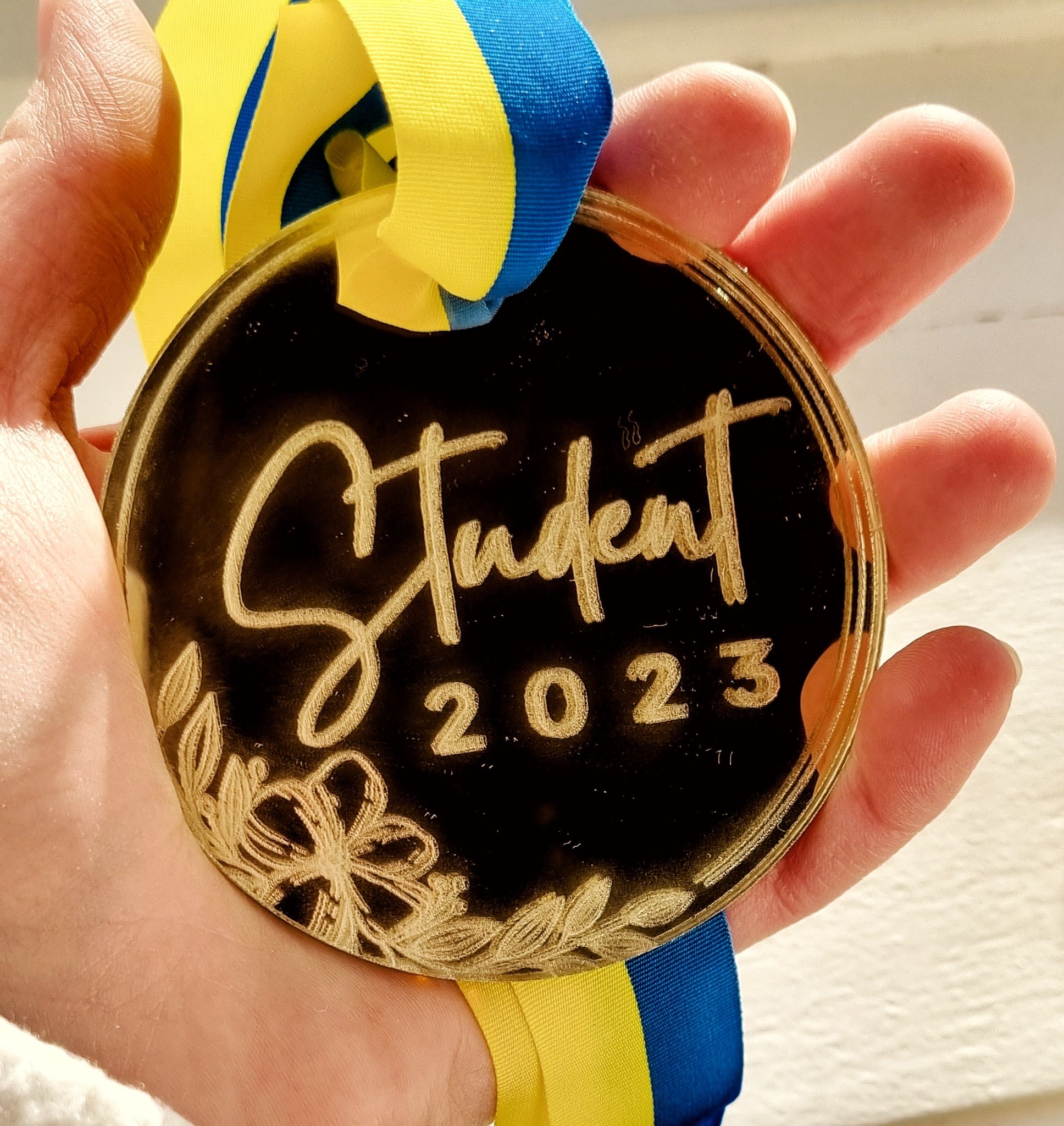 Medalj: STUDENT, blomma (2024)