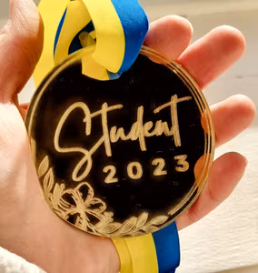 Medalj: STUDENT, blomma (2024)