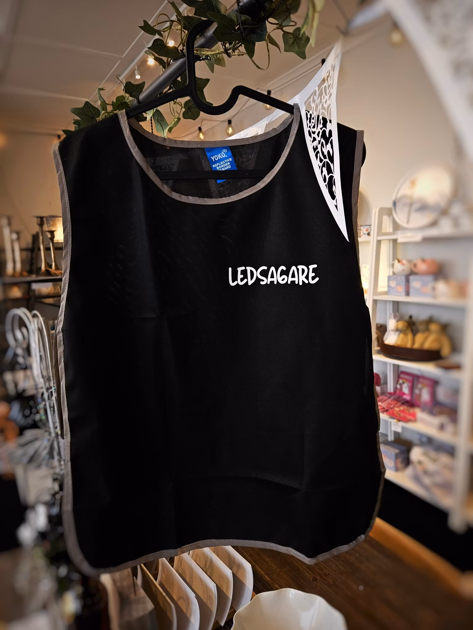 Informativ reflexväst: Ledsagare [Vuxen - svart]