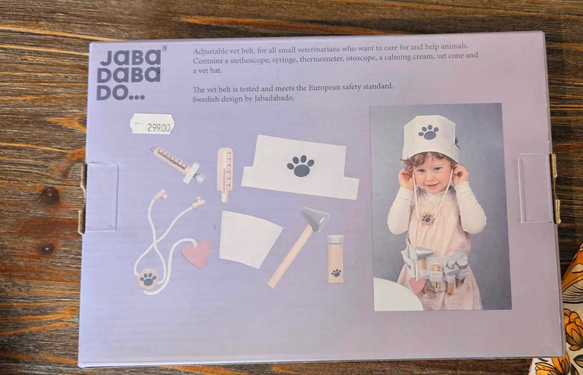 Veterinärbälte i trä [OBS! solblekt kartong]
