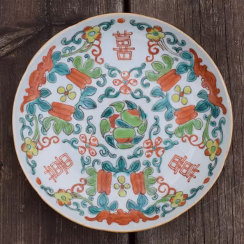 Antique chinese famille rose plate decorated with happiness characters and bats
