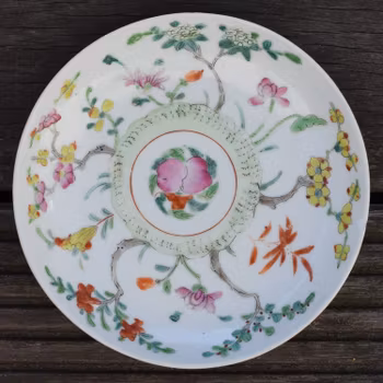 Antique chinese famille rose plate decorated with flowers, peach and bat