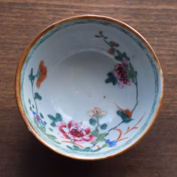 Antique Chinese teacup decorated in famille rose Early 18th C Yongzheng