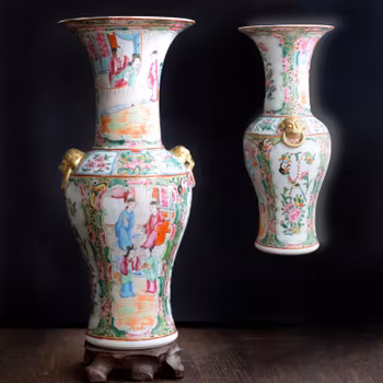 An antique canton rose mandarin vase with gold gilded lion handles