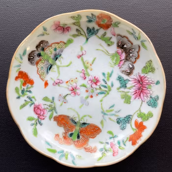 A celadon dish with butterflies First half of 19th c Jiaqing / Daoguang #929
