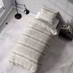 Naturalist ett påslakanset med en ljust linnefärgad botten i mått 140 x 200 cm och ett gråblått mönster i bomull med dragkedja i botten.