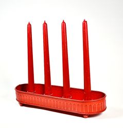 Adventsljusstake i röd plåt.