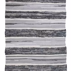 Regina en trasmatta i gråa toner från Svanefors i mått 160 x 230 cm.