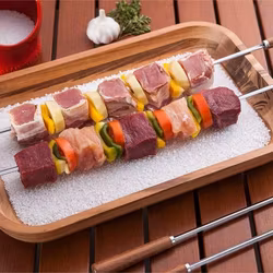 Grillspett från Tramontina med ett V format spett och trähandtag i körbärsträ. Färg: Stål med ett trähandtag i körsbärsträ.