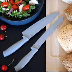 Kockkniv Sam med Teflonbehandlat blad från Modern house. Färg: Grå.