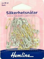 Säkerhetsnålar i blandade storlekar. Färg: Silver och guldfärgade.