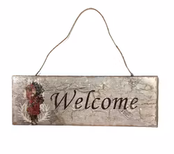 Skylt Welcome i trä med en patinerad look.