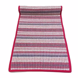 Sprall en vävd löpare i rosa, blått, vitt, lila med rosa kantband i bomull från Boel & Jan, mått 45 x 140 cm.