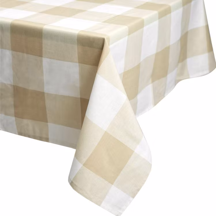 Vattenavvisande duk från Noble house. Färg: Beige och vitrutig.