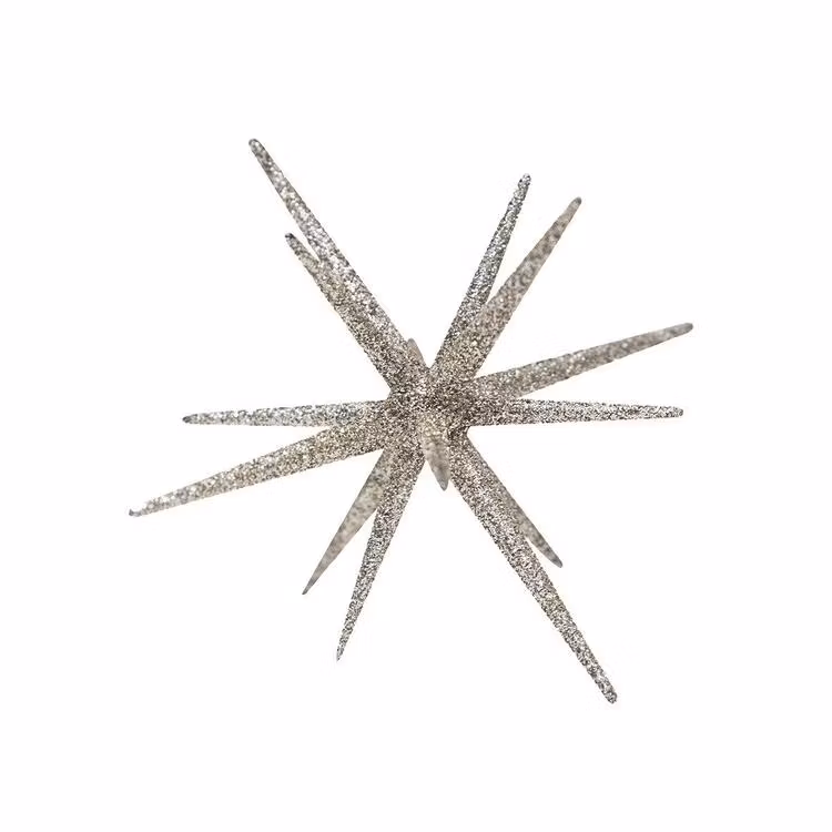 Sputnik en silverfärgad stjärnformad dekoration med glitter från Svanefors.